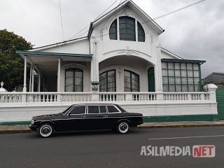 GREEN-AND-WHITE-MANSION.-CARTAGO-COSTA-RICA-MERCEDES-LIMOUSINE-TRANSPORTATION.jpg