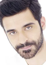 Угур Узунел