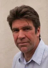 Грег Баркер