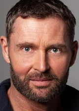 Адриан Буше